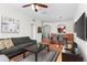 Comfortable condo living room with an open floor plan, connecting the living and dining areas, perfect for entertaining at 4114 Breakview Dr # 11002, Orlando, FL 32819