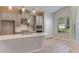 Beautiful kitchen with stainless steel appliances, a kitchen island, and a large window for natural light at 4147 Coral Harbour Rd, Kissimmee, FL 34758