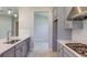 Modern kitchen with quartz countertops, gas range, subway tile backsplash, and stainless steel appliances at 4147 Coral Harbour Rd, Kissimmee, FL 34758
