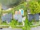 Aerial view showcases the property's layout, pool, deck, and proximity to the water at 417 Barclay Ave, Altamonte Springs, FL 32701