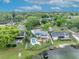 The backyard has a pool, a deck, a dock, and direct access to the serene lake at 417 Barclay Ave, Altamonte Springs, FL 32701