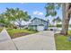 Exterior of two-story home with attached garage and a long driveway, situated on a well-maintained lot at 417 Barclay Ave, Altamonte Springs, FL 32701