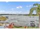 Amazing lake view with a boat dock and tropical landscaping from this beautiful property at 417 Barclay Ave, Altamonte Springs, FL 32701