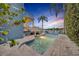 An inviting pool, set against the backdrop of a tranquil lake, promises outdoor relaxation and picturesque views at 417 Barclay Ave, Altamonte Springs, FL 32701