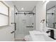 Modern bathroom featuring a glass-enclosed shower, sleek vanity, and contemporary fixtures at 4729 Arrow Rd, Orlando, FL 32812