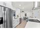 Bright living room features stylish seating, skylights, and modern décor, creating a welcoming and comfortable space at 4729 Arrow Rd, Orlando, FL 32812