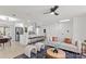 Open floor plan with a living room and kitchen, creating a seamless and inviting living space at 4729 Arrow Rd, Orlando, FL 32812