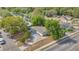 Aerial view of the home surrounded by lush greenery at 5201 Van Aken Dr, Orlando, FL 32808