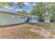 Spacious backyard featuring a well-maintained lawn, providing a serene outdoor retreat at 5201 Van Aken Dr, Orlando, FL 32808