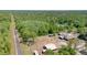 Extensive aerial view of a home and acreage with a treed boundary at 5242 Bancroft Blvd, Orlando, FL 32833