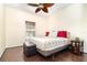 Bedroom featuring hardwood floors, large window, and an inviting atmosphere for relaxation at 5242 Bancroft Blvd, Orlando, FL 32833