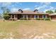 Charming single-story home with well-maintained landscaping and a spacious front lawn at 5242 Bancroft Blvd, Orlando, FL 32833