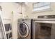 Laundry room with modern washer and dryer at 5242 Bancroft Blvd, Orlando, FL 32833