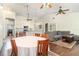 Bright, open-concept living and dining area with hardwood floors and abundant natural light at 5242 Bancroft Blvd, Orlando, FL 32833