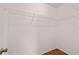 Walk-in closet featuring wood floors and wire shelving at 5258 Tunbridge Wells Ln # 4, Orlando, FL 32812