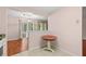 View of the dining area with a small table and view into a patio at 5258 Tunbridge Wells Ln # 4, Orlando, FL 32812