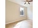Inviting bedroom with a ceiling fan and a well-lit window at 54 Malauka Trak, Ocklawaha, FL 32179