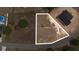 Aerial view of a vacant lot with a white border, positioned next to a home and a road at 55 Laurel Crse, Ocala, FL 34480