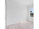 Bright bedroom with a large window, closet, light wood floors, and neutral walls at 55 Laurel Crse, Ocala, FL 34480