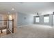 Loft featuring carpet, staircase, and neutral walls at 563 Copperdale Ave, Winter Garden, FL 34787