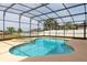 Enjoy this beautiful in-ground pool inside a screened enclosure with an adjoining spa and plenty of room for seating at 563 Copperdale Ave, Winter Garden, FL 34787