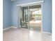 View of the screened patio from the sunroom at 563 Copperdale Ave, Winter Garden, FL 34787
