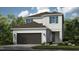 Charming two-story home with a two-car garage, neutral paint, and an inviting front entrance at 5646 Ficus Aurea St, Kissimmee, FL 34758