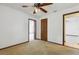 Bedroom featuring two doorways and a ceiling fan at 7602 Glenmoor Ln, Winter Park, FL 32792