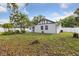 Exterior view of home featuring a well-maintained yard at 7602 Glenmoor Ln, Winter Park, FL 32792