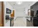 Open kitchen floor plan featuring granite counters and a seamless transition to the living area at 7602 Glenmoor Ln, Winter Park, FL 32792