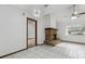Bright living room featuring a cozy fireplace and seamless room transitions at 7602 Glenmoor Ln, Winter Park, FL 32792