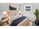 Cozy bedroom with soft lighting, a plush rug, and tasteful decor creates a relaxing retreat at 800 Marion Dr, Mount Dora, FL 32757