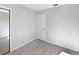 Bedroom with a closet, plush carpet, fresh paint and plenty of natural light at 800 Marion Dr, Mount Dora, FL 32757