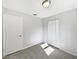 Bright bedroom with a closet, plush carpet, and fresh paint at 800 Marion Dr, Mount Dora, FL 32757