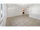 Spacious living area featuring neutral tones, tiled flooring, and ample natural light at 800 Marion Dr, Mount Dora, FL 32757