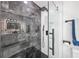 Sleek, updated bathroom with a glass shower, modern fixtures, and tiled walls at 8143 Britt Dr, Orlando, FL 32822