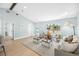 Inviting living room with neutral tones, ample natural light, and stylish decor at 8143 Britt Dr, Orlando, FL 32822