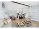 Bright living area showcasing modern finishes, open layout, and seamless flow to kitchen and dining at 8143 Britt Dr, Orlando, FL 32822