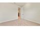 Neutrally-toned bedroom with carpet, a glimpse of the stairs, and access to closet space at 13231 Panama Beach Ct, Orlando, FL 32827