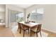 Dining area with natural light, sliding glass doors, a wooden table, and seating for six at 13231 Panama Beach Ct, Orlando, FL 32827