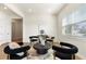 Cozy sitting room with modern furnishings, natural light, and stylish decor creating an inviting atmosphere at 13231 Panama Beach Ct, Orlando, FL 32827
