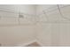 Walk-in closet with adjustable wire shelving for ample and customizable storage space at 1755 Waterview Dr, Leesburg, FL 34748