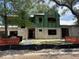 Exterior view of a two-story home under construction with block walls and green sheathing at 1910 Glencoe Rd, Winter Park, FL 32789