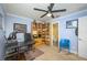 Home office with custom shelving and ample lighting at 4469 Old Bear Run, Winter Park, FL 32792