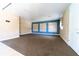 Meeting room featuring neutral walls, carpeting and a blue accent wall with picture frames at 4874 Matteo Trl, Orlando, FL 32839
