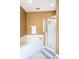 Bright bathroom featuring a soaking tub and a glass enclosed shower stall at 5201 Lake Marion Golf Resort # 5201, Kissimmee, FL 34759