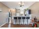 Cozy breakfast bar featuring seating for four, modern appliances, and an open layout at 5201 Lake Marion Golf Resort # 5201, Kissimmee, FL 34759