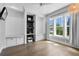 Bright bonus room featuring built-in shelving, comfortable seating, and a large window at 1224 Union Club Dr, Winter Garden, FL 34787