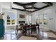 Sun-filled dining area features fireplace and scenic views at 1224 Union Club Dr, Winter Garden, FL 34787