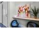 Charming hallway featuring modern decor, a shelf, unique art, and a fern at 1224 Union Club Dr, Winter Garden, FL 34787